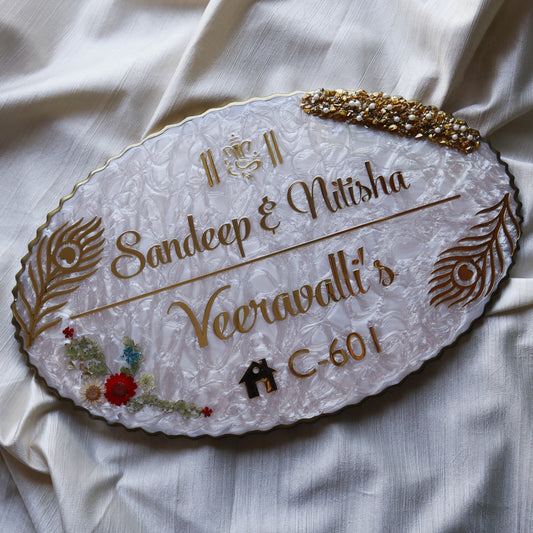 Resin material +golden font + real dry flowers on the side + wooden base