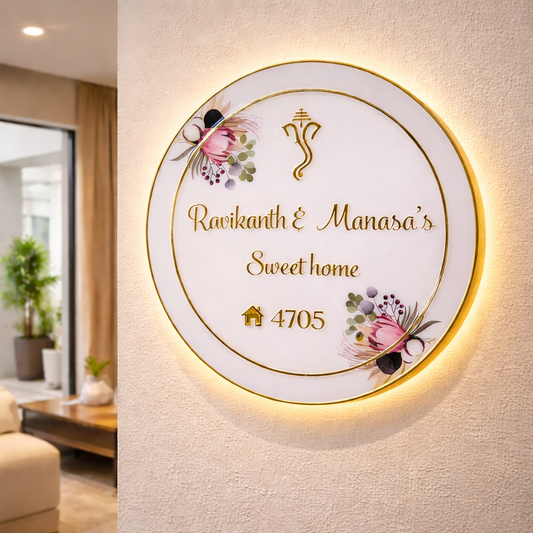Personalized round resin coated nameplate with gold border and soft backside LED light installed on modern flat wall, luxury home decor nameplate by Kraftorio